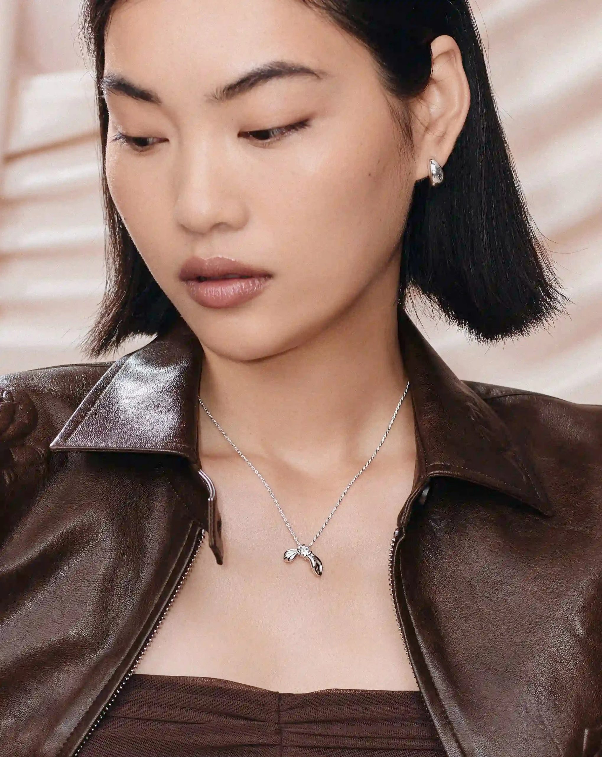 MARKGONG Bow Pendant Necklace | Silver Plated - Image 3