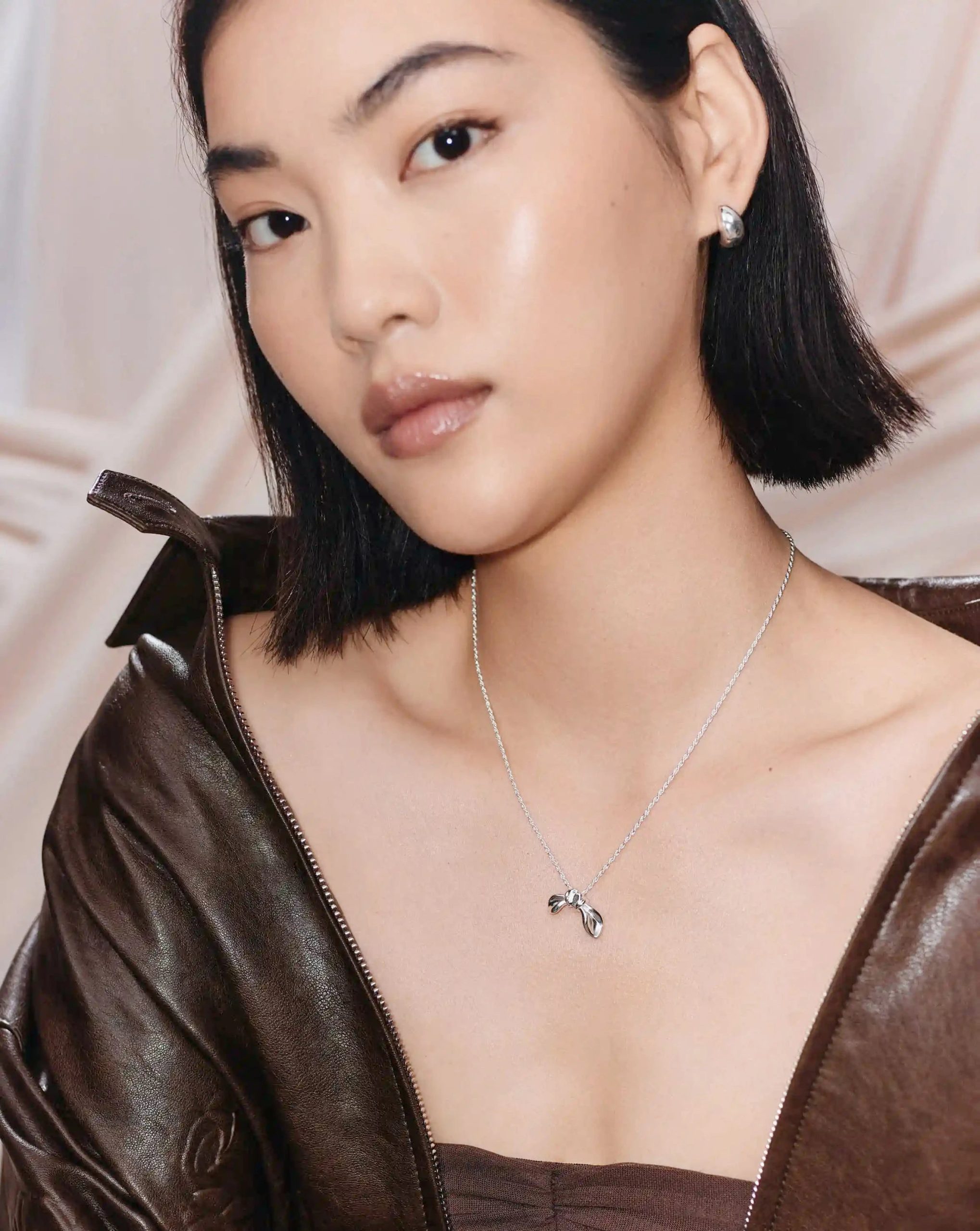 MARKGONG Bow Pendant Necklace | Silver Plated - Image 6