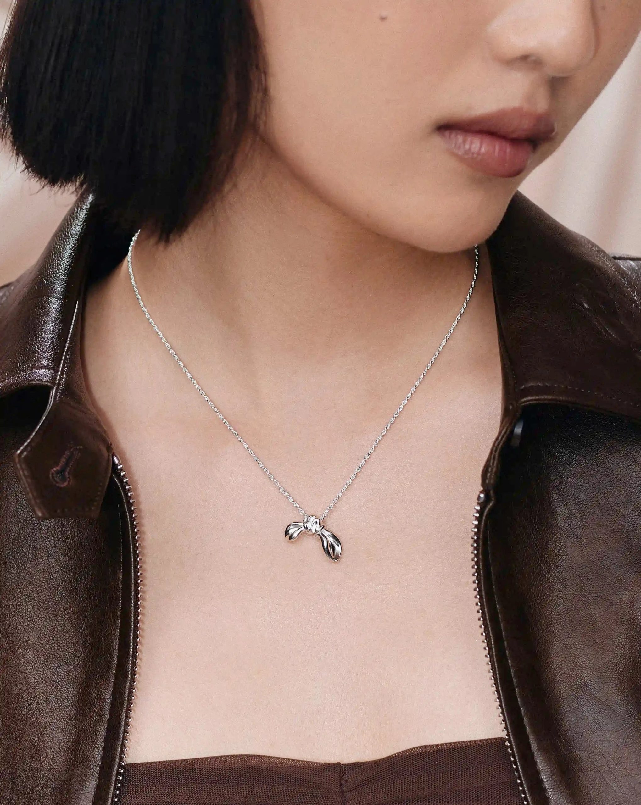 MARKGONG Bow Pendant Necklace | Silver Plated - Image 2